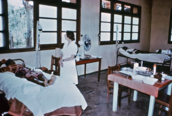 While working through a handle of Kentucky bourbon one night, they looked at a poorly drawn map and saw the Ebola River — somewhat nearby, but not as close as they thought. But that’s the name they chose. They’d been calling the disease the Yambuku v