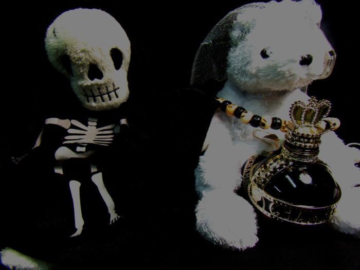 One of La Santa's plushes shown here happily seated alongside Maman Brigitte's bear. The ladies get along quite well, though Brigitte has her own area. I thank both ladies for their gracious permission for the shoot.