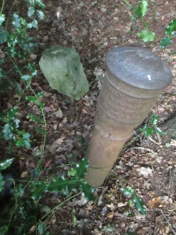 In the shadow of Snaresbrook Crown Court I found this oddity. I'm told it's where there was a power point for an Anti Aircraft Battery in WWII. The stone beside it is a boundary marker