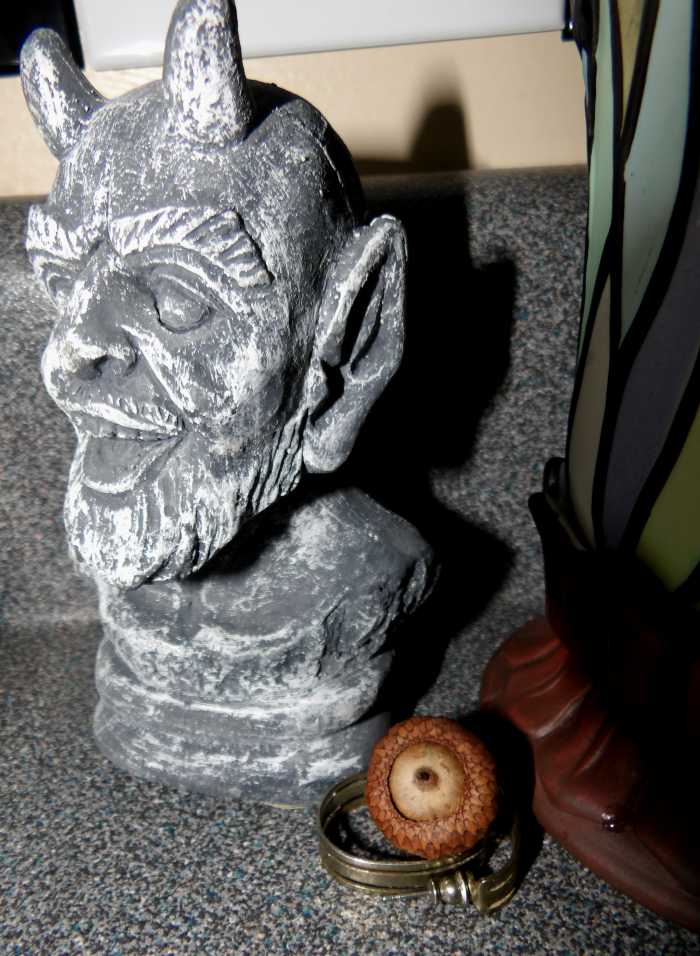 His newly dedicated kitchen mini altar. I'm far from perfect, this statue and gifts were tucked away and forgotten until recently.