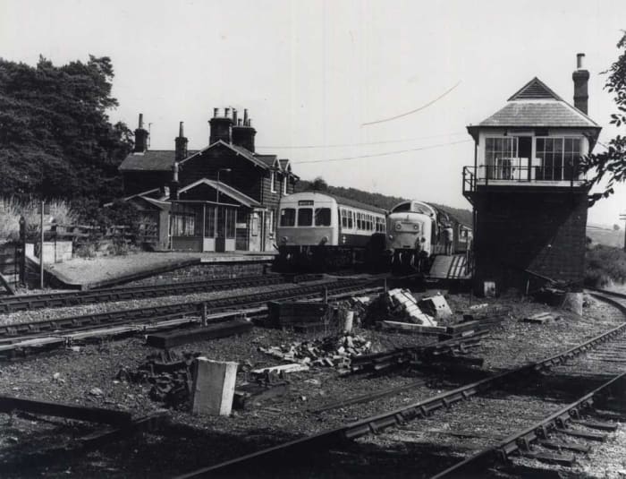 Castleton Station in the 1960s. A Whitby-bound dmu stands at the 'Down' platform, a visiting Deltic diesel at the 'Up' - is this the year Whitby Town FC qualified to play in the FA Cup Final at Wembley?