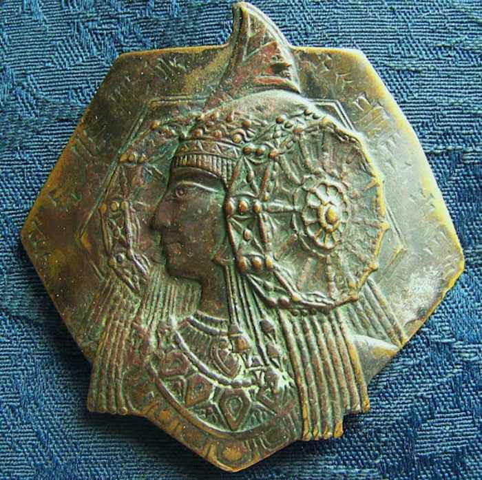 This copper medallion was found by a man digging a trench for a sewer line about six and half feet down in Utah, in 1966.