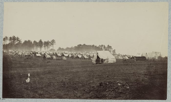 The troops and camp workers had varied shelter with some log structures, mostly tents though.