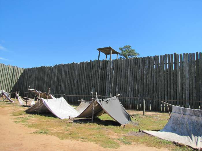 This reconstruction shows how prisoners of war created shelters for themselves in Andersonville Prison in Georgia. The lucky ones used canvas to form tents and a few even got some wood for slightly larger structures. The majority lacked any shelter.