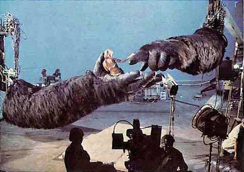 Behind the scenes of King Kong (1976) showing Jessica Lange in the hands of the robotic gorilla being controlled by computers. It's noticeable in the movie when the camera switches back and forth between the robotic King Kong and the real actor.