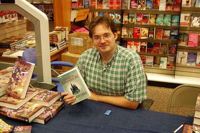 Brandon Sanderson holding a German-language copy of his fantasy novel Elantris on August 18, 2007 at the book pre-release event for Mistborn: The Well of Ascension at the Waldenbooks store in the Provo Towne Centre mall in Provo, Utah.