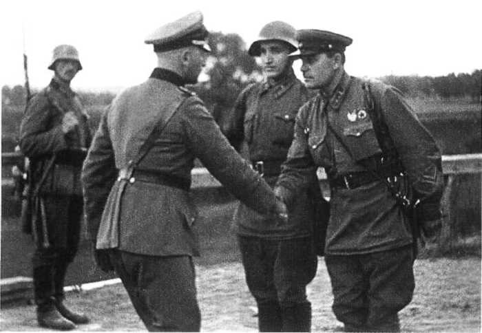 German and Soviet officers shake hands near Brest-Litovsk Poland near the end of the invasion.