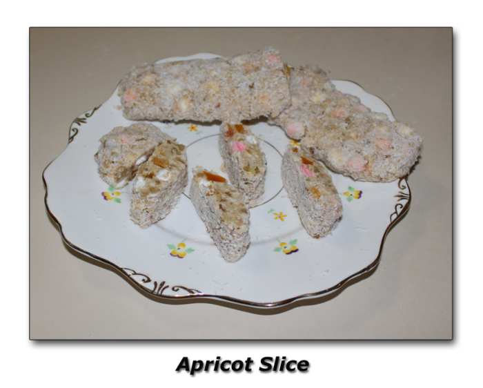 The lovely mixture of sweet and sour make these Apricot Slices just the thing to have with Coffee or Tea