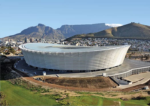 This subtle but attractive stadium is less a statement of its own than an exclamation point for a city with more than its share of iconic scenery. Positioned near the tip of Africa, Cape Town boasts an incredibly scenic oceanfront. And with Table Mou