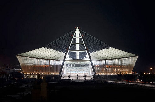 This brand new stadium in Durban has maybe the most unexpected design of all the World Cup Stadia. Modeled after the South African National Flag, the stadium has a 105-meter-high arch that runs the length of the oval-shaped structure. At one end, tha