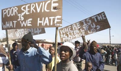 Poor people and workers protesting the Unfair treatment they are getting from both Fifa and the African government
