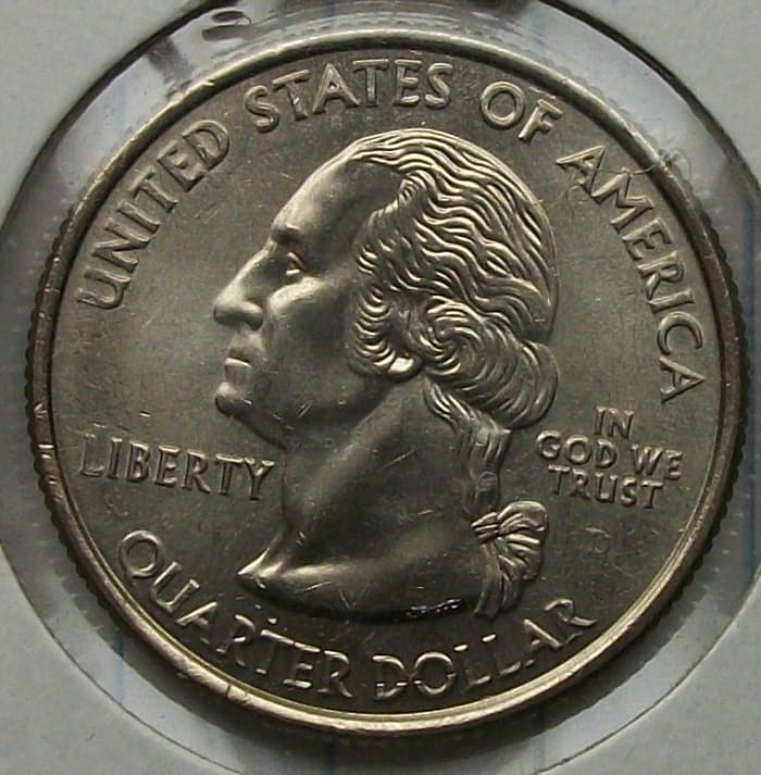 Obverse of the 2008D Oklahoma Statehood Quarter Fading D mint mark most likely caused by die polishing.