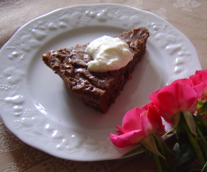 I love to make this rich, moist chocolate cake. This is served on a Limoges Porcelain plate, one of the regions most famous products.