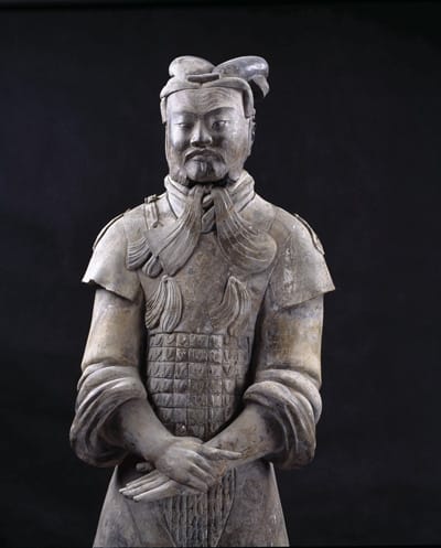 General does not wear armour. He wears the kind of cap tied with tassels that hang under his chin. A belt with a buckle secures the double-layered tunic Only nine generals have been found at the site.