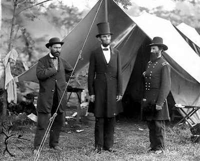 Lincoln was not a member to the secret agenda. This photo says two things to those initiated into secret rites. First, the two generals are with them. Second, Lincoln isn't.