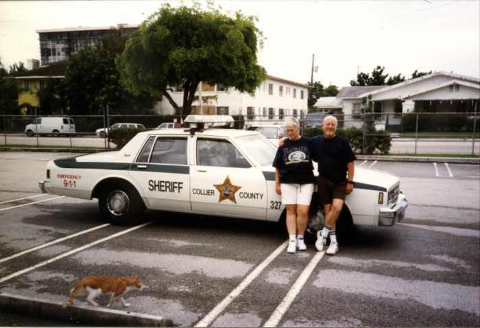 I think that this car was just an example of a typical police patrol car. I seem to be more interested in the cat that is passing by than posing for the photograph.