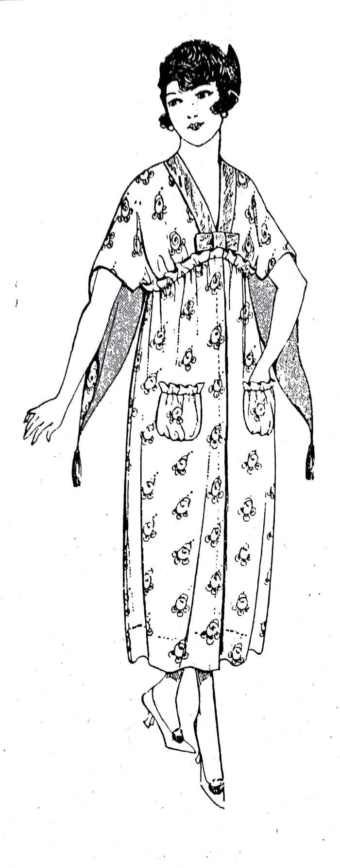 This is called a "bath-robe" in the 1917 book American Dressmaking Step by Step. It looks similar to the "wrappers" in the 1918 catalog above.