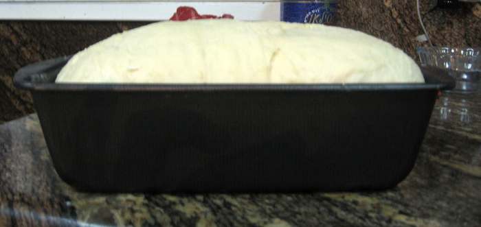 After the bread dough has raised in the loaf pan, you are ready to pop it into a 400F pre-heated oven for 14 - 19 min. Don't forget the egg wash!