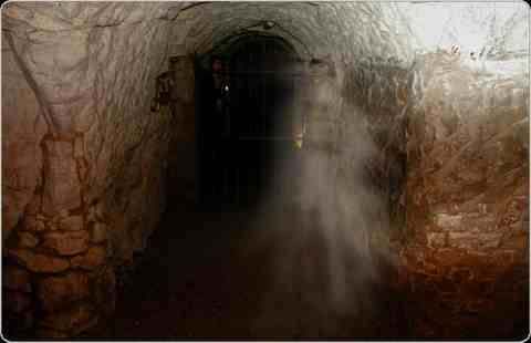 Can you see the ghost of the White Lady at The Hellfire Caves High Wycombe? Photo Nell Rose Postcard