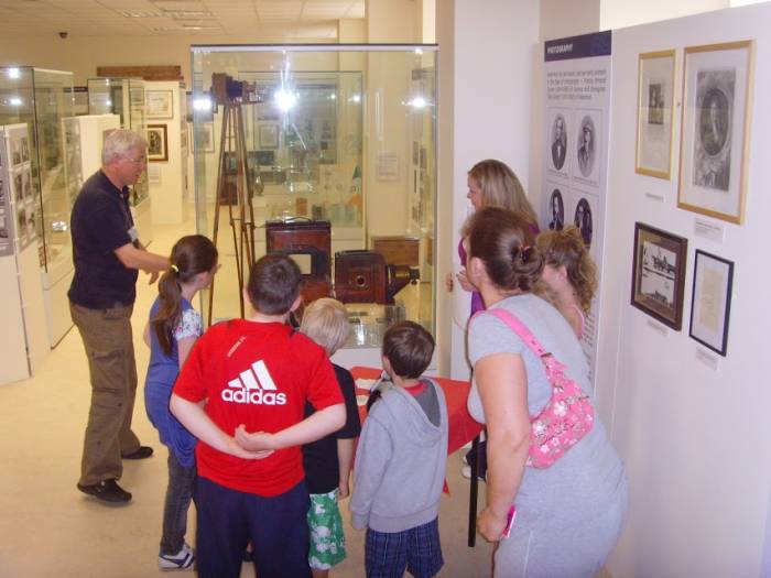 The Sports Section of the County Waterford Museum in Dungarvan, Ireland, where "Yonkers Favorite" lightweight boxing champion Shamus O'Brien (born Michael J. Hogan) is remembered. His 1913 boxing poster can be seen on the far wall in this photograph.