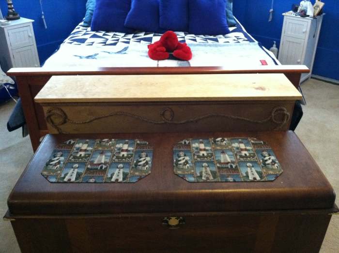 I used a rope to decorate the front of the cabinet to try to blend in with the nautical cottage feel of the room