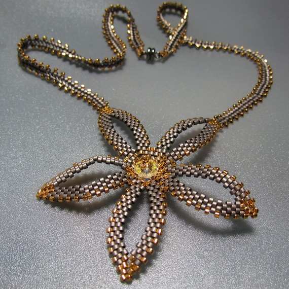 Snowdrop Necklace: This necklace combines a peyote flower with a herringbone rope.