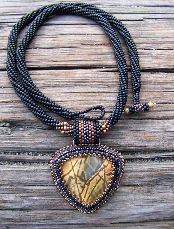 Spiral Herringbone Necklace With Cherry Creek Jasper Pendant: Lori uses a twisted tubular herringbone rope with a peyote beaded cabochon.