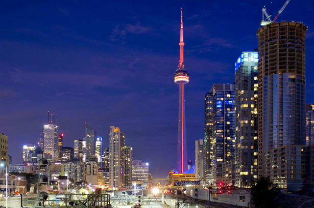The CN Tower is lit orange from sundown Saturday until sunrise Sunday to commemorate the passing of Jack Layton.