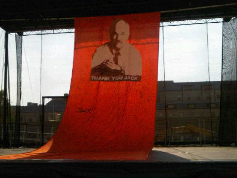 The banner is filled with hundreds of signatures and messages. It's been hung on the square's stage.