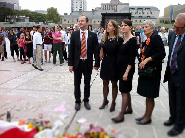 From left, Jack Layton's son Mike stands with his partner, Brett Tryon, his sister, Sarah, and Jack Layton's sister, Nancy, outside Toronto city hall.