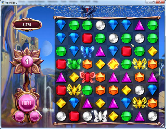 Butterflies mode: The blue butterfly is in greatest danger of being eaten, and the spider is poised ready above it. However, it can be rescued by swapping the blue gem in column 1, row 2 with the green gem below to form a match of 3 blue gems.