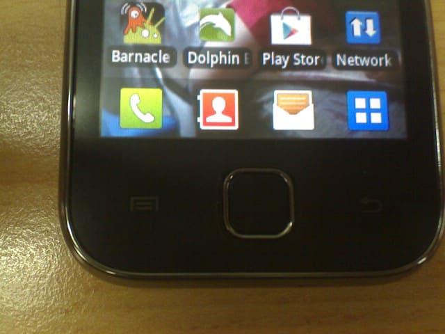 Pic A: On the front face of the phone, press the button on the left side of the home button (square middle button).