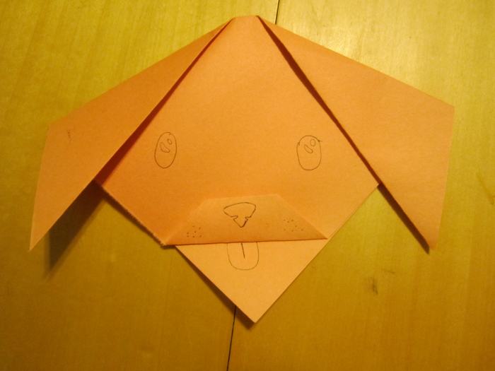Draw on face and features (I'm sure you can do a much better job than me!). You can also fold back the bottom tip if you don't want the mouth open.