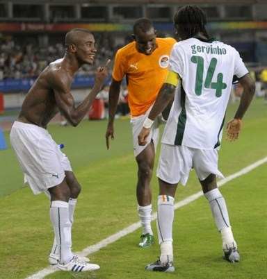 Solomon Kalou (L), Sekou Cisse (C) and Gervinho (R) celebrate for the Ivory Coast following a goal by Gervinho late in its match against Serbia in Shanghai on Aug. 10, 2008. The Ivory Coast won 4-2