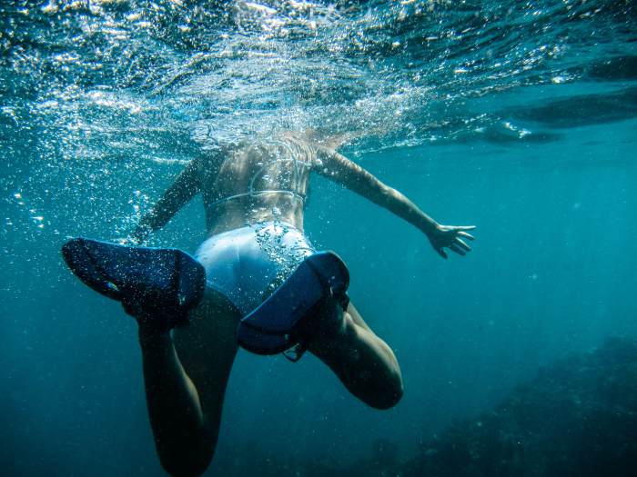 You wouldn't be able to get this perspective of the swimmer from above the water.
