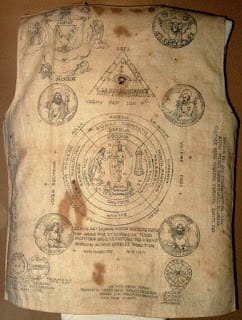 A Vest worn by a Filipino Revolutionary during the Philippine Revolution circa late 1890s-early 1900s. Contains Folk-Catholic prayers in peasant's butchered Latin, and instructional diagrams on when or where the shirt would work.