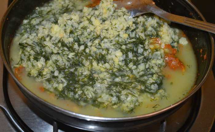 Step five: Add cooked mung beans and lentil mixture. Mix well with the contents in the pan. Add some water if needed. Bring the mixture to a gentle boil and simmer for a minute. Turn off the heat.