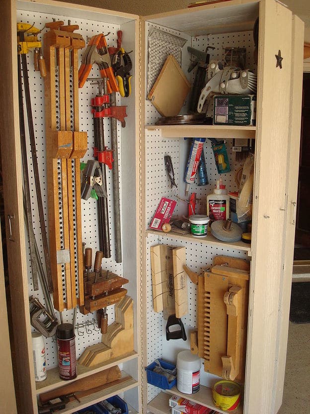 This is a tri-fold cabinet with one side opened to reveal center and one side section.