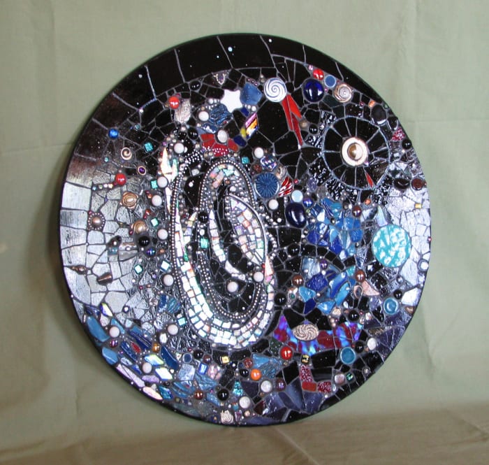 Mosaic wall art, two feet in diameter, stained glass, dichroic glass, semi-precious gems, vintage costume jewelry (sold)
