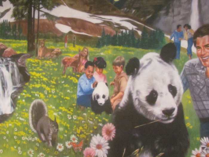 The promise by God at Isaiah 11:7, 8 is beautifully displayed in this painting where, "The cow and the bear will feed together, and their young will lie down together. . .The nursing child will play over the lair of a cobra,"