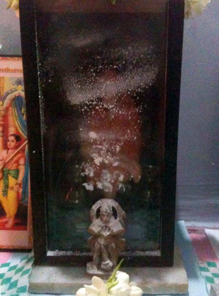 This was on 24th april, 2014. I was feeling a bit low as vibhuti had stopped manifesting for almost a month. That day, the blessing manifested as vibhuti specks on Hanuman and Shirdi Baba.