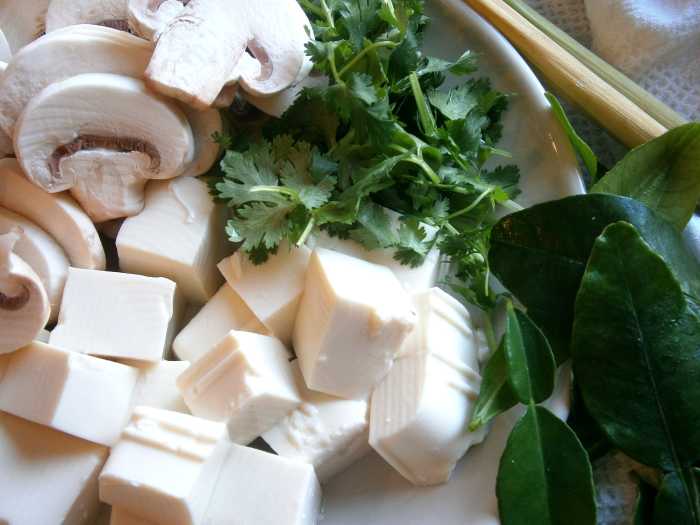Cubed soft tofu, sliced button mushroom, cilatnro and kaffir leaves make up the rest of the fresh ingredients..