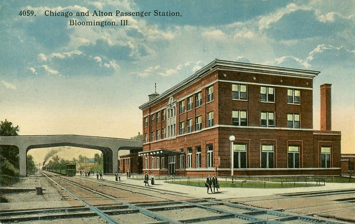 Postcard of Bloomington, Illinois passenger rail station, circa 1925. This station served the area from the early 20th Century through 1991. Many other photos of the building are available at RailPictures.net