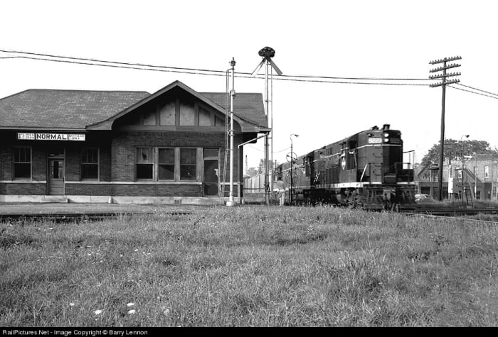 The Normal, Illinois station at the crossing of the Illinois Central and Gulf, Moble & Ohio lines, as pictured on September 15, 1963. This station was demolished in the 1970s.