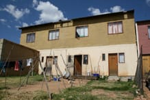A remodeled hostel turned into a double-storey flat. The contractor reused old roof which are now falling off