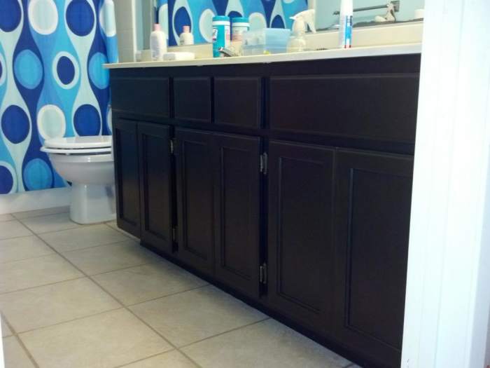 After - Looks like new, professionally built cabinets. You can still see the wood grain, so it doesn't look like they are just painted.