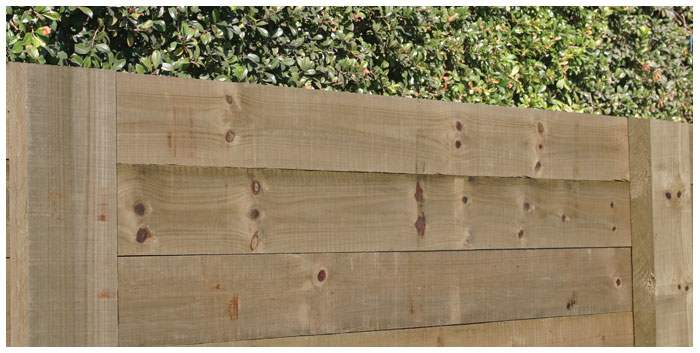 We believe that most people will be able to build a timber retaining wall, perhaps not as high as the one shown in the picture, but just a couple of timber planks high.