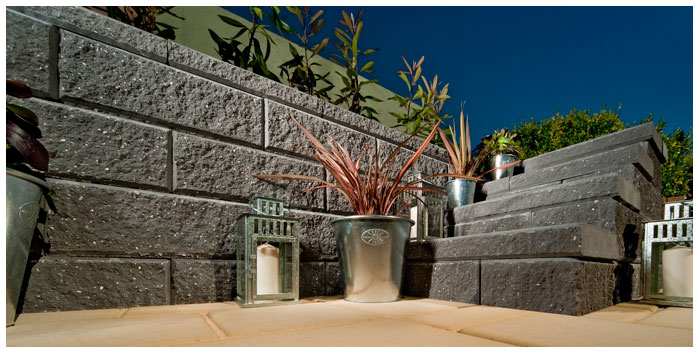 Not all concrete walls require fresh cement when you build them, some of these concrete blocks are made to be laid dry, like the one in this photo and many others, check with the link in this section.
