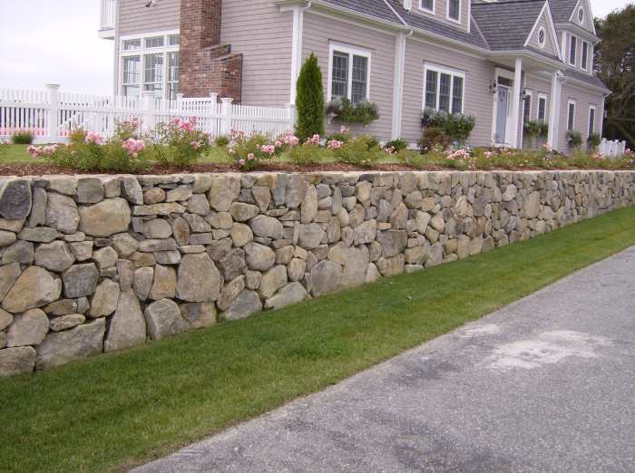Although this picture has been taken from the internet, where I could not find what I wanted. This is how a hybrid rock wall can look like if built properly, and as explained in this text. But in the text it is different shape.