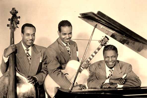 The King Cole Trio : Nat King Cole on the piano, Oscar Moore on Guitar and Wesley Prince on the Doube Bass